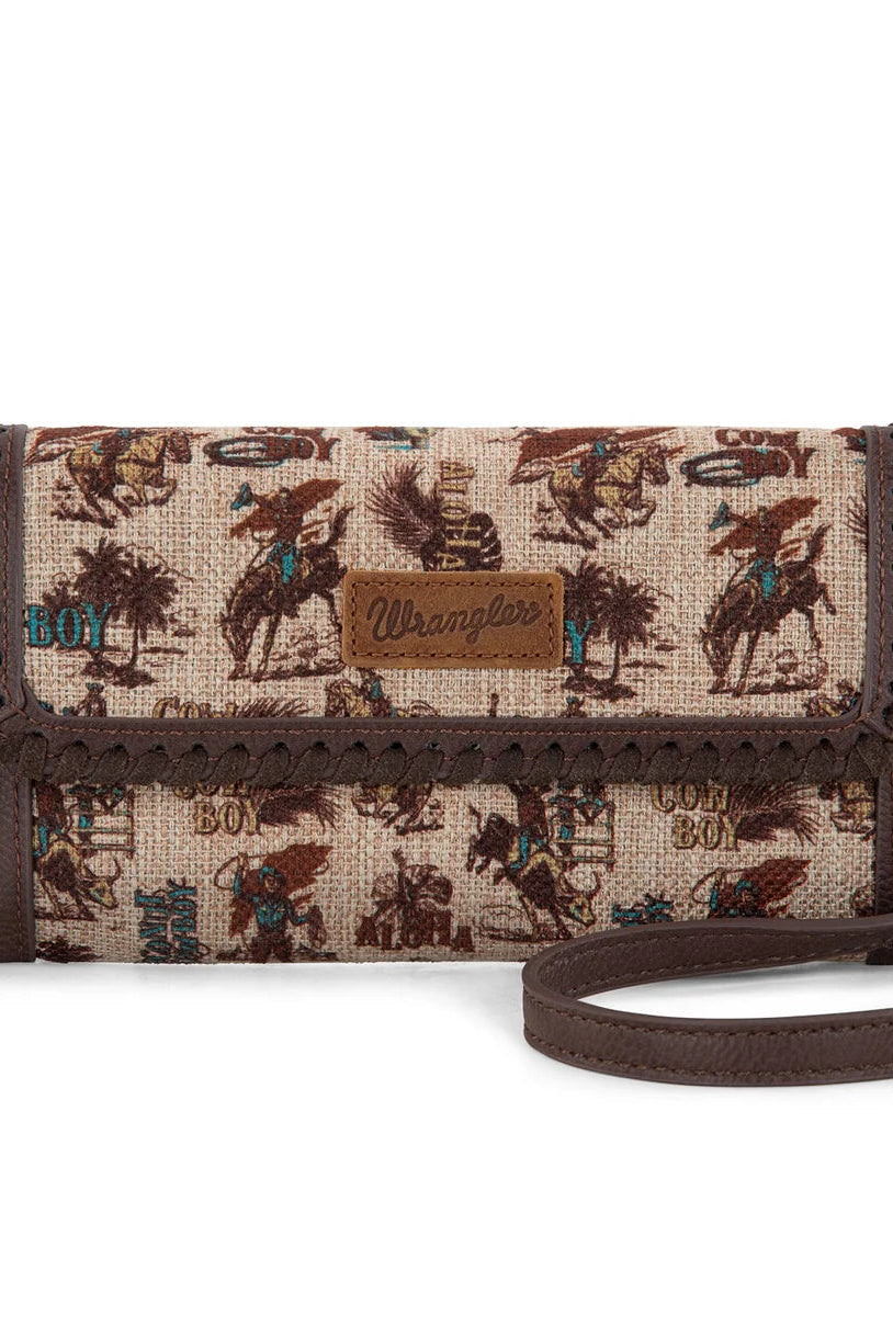 Trestles Clothing Company retro cowboy print canvas and PU leather crossbody wallet with whipstitch flap detail
